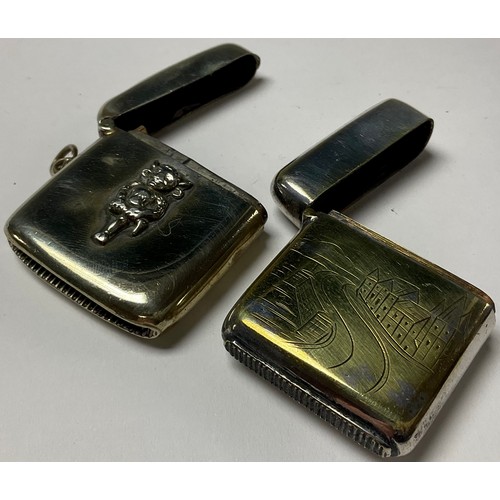 307 - An early 20th century rectangular vesta case, mounted with Lincoln Imp; another, chased with street ... 