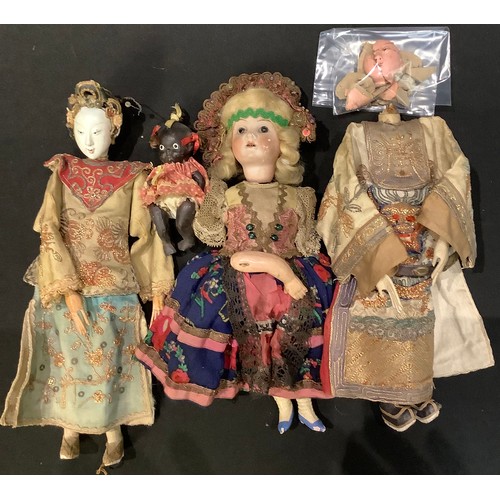 321 - A 19th century Chinese opera doll; a Chinese doll a/f; a Koppelsdorf German doll; a small black porc... 