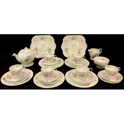 358 - A Shelley Wild Flowers pattern tea set, pattern  number 13668, comprising teapot, milk and sugar, si... 