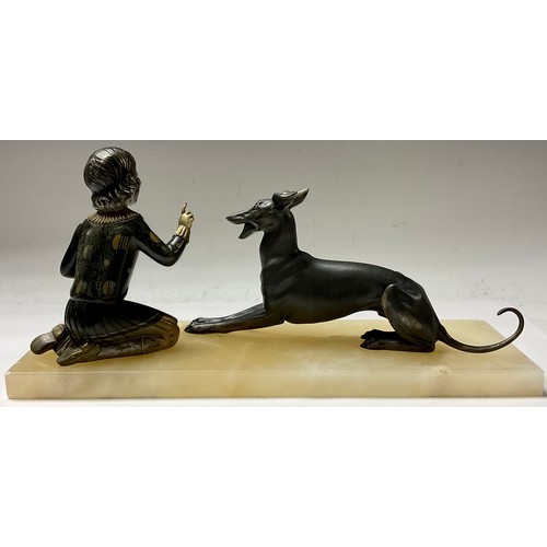 387 - A French Art Deco spelter figure group, young girl training a whippet, rectangular marble base, 40cm... 