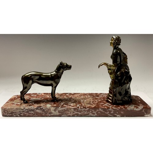 391 - A French Art Deco spelter figure group, dainty lady in 18th century dress with a mastiff dog, shaped... 