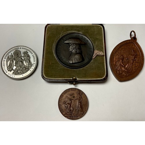 432 - A Joseph Fry Bicentenary 1928 bronze medallion, cased; three other medallions (4)