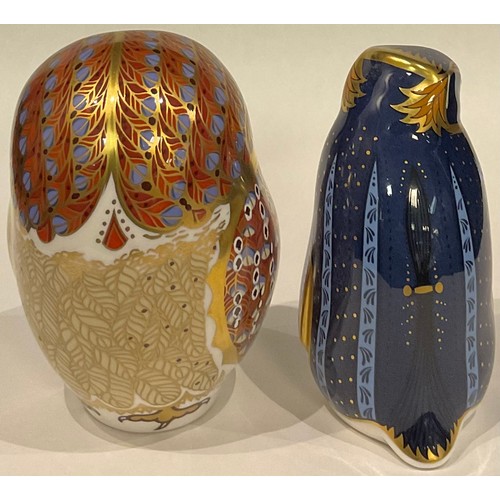 408 - A Royal Crown Derby paperweight, Barn Owl, gold stopper, boxed; another, Rockhopper Penguin, gold st... 