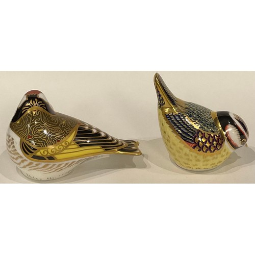 409 - A Royal Crown Derby paperweight, Goldfinch, gold stopper, boxed; another, Garden Blue Tit, gold stop... 