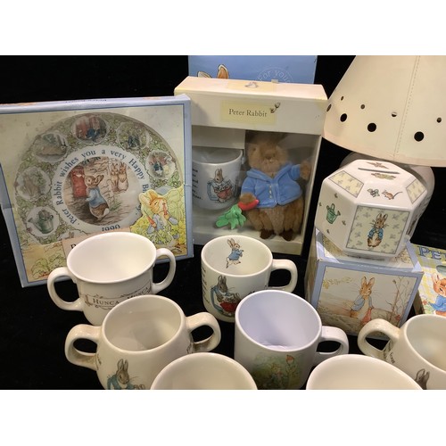 450 - A Wedgwood Peter Rabbit tea time set, mug and bowl, boxed; another; others, a Wedgwood Peter rabbit ... 