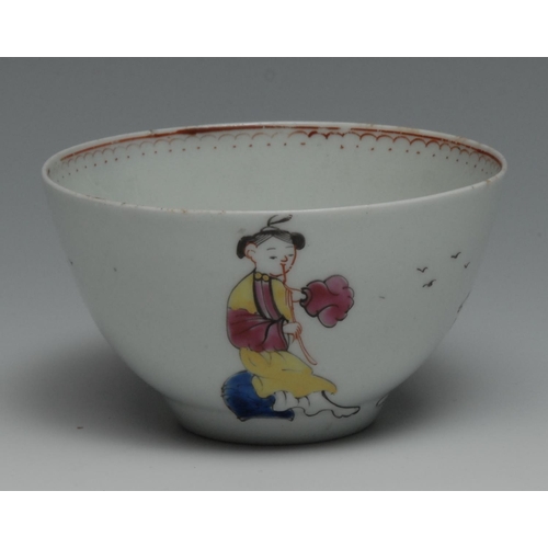 179 - A Christian Liverpool tea bow, decorated in polychrome with oriental figures, boy with kite and a do... 