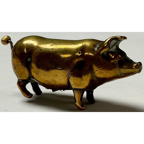 470 - A Victorian novelty brass needlework tape measure, modelled as a pig