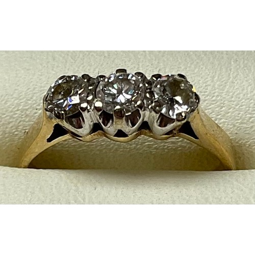 517 - A 9ct gold three stone diamond ring, marked 375, size K, 2g