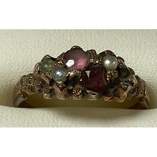 534 - A ruby and seed pearl gold coloured metal ring