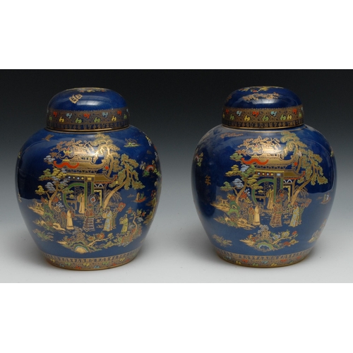 474A - A pair of Carlton Ware Pagoda pattern ginger jars and covers, printed and painted with pagoda and fi... 