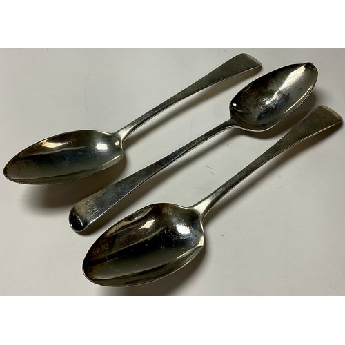 240 - A pair of George III silver serving spoons, London 1812; another, London 1804; 174g (3)