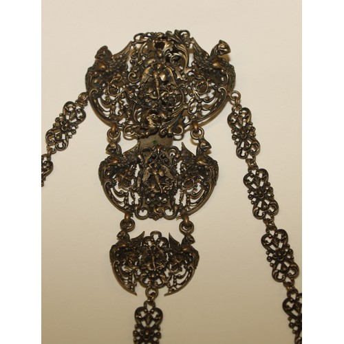 19 - Sewing - a 19th century silver plated chatelaine, in the Renaissance Revival taste, the three chains... 