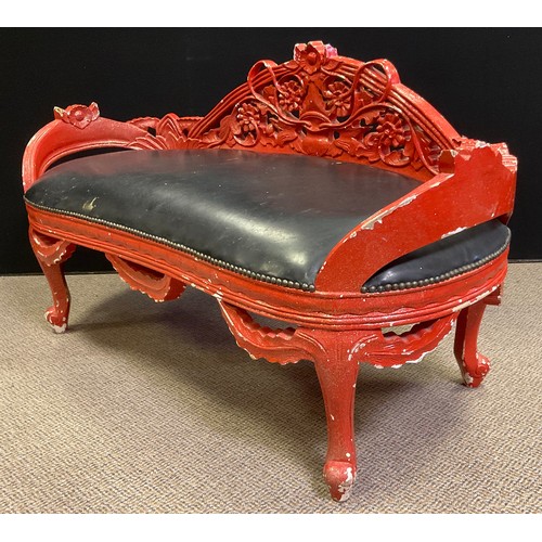 20 - An early 20th century French rococo style window / love seat, carved and painted fruitwood, 71cm tal... 