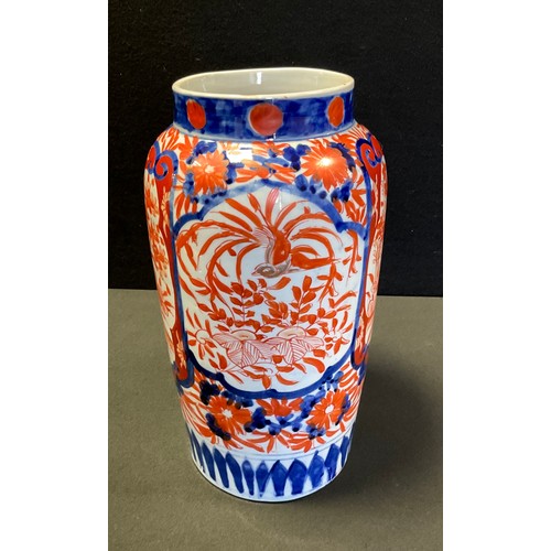 59 - A late 19th/early 20th century Japanese Imari vase, quartered panels, 26.5cm high