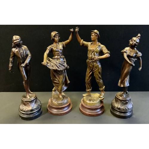 61 - After Emile Guillemin, a pair of bronzed spelter figures, ‘Moissonneur’ and ‘Retour des Champs’, eac... 