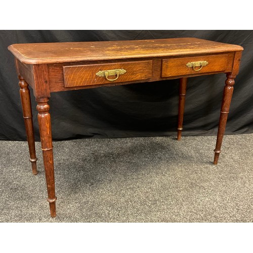 62 - A Victorian oak Console table, rounded rectangular top, pair of short drawers to frieze, turned legs... 