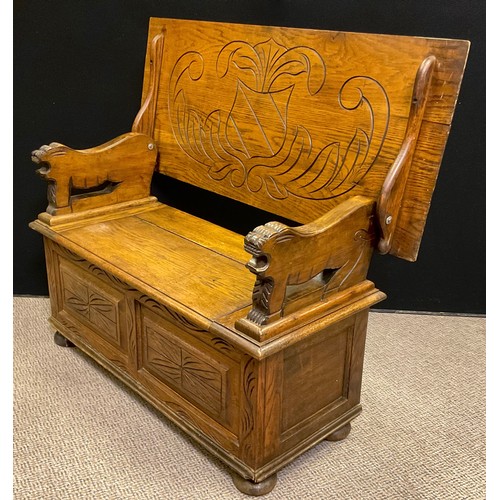 67 - A mid 20th century oak Monk’s bench, 62cm tall (93cm with top in upright position) x 107cm wide x 45... 