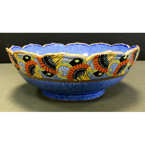 69 - A Crown Ducal Charlotte Rhead ?? bowl, banded with orange, yellow , green and black flowers, blue mo... 