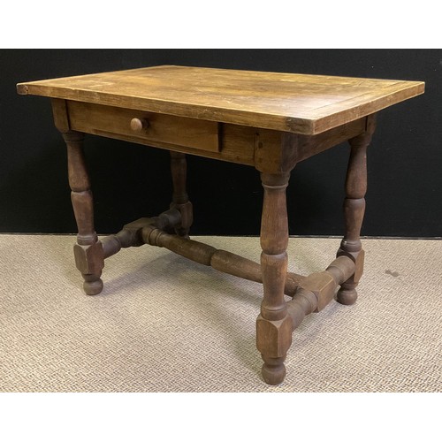 79 - An early 20th century french oak side table, single shallow drawer to frieze, turned supports and st... 