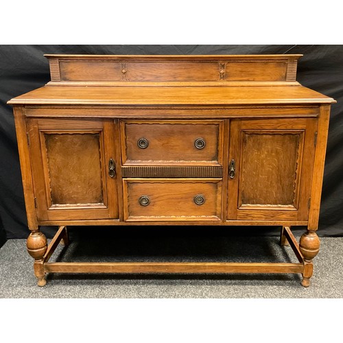 86 - A mid 20th century oak sideboard, 108cm tall x 137cm wide x 47cm deep.