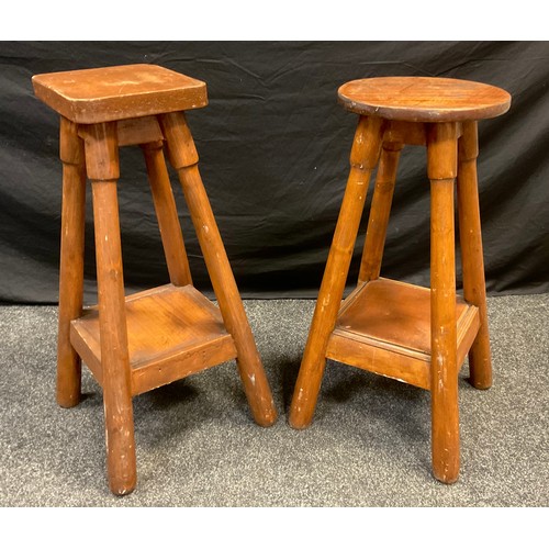 90 - A 20th century French pine and mahogany stool, circular seat, 75.5cm tall;  another, similar, with a... 