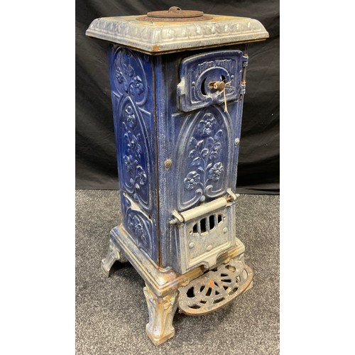 95 - An early 20th century Arthur Martin cast iron and blue enamel, single hob, wood burner stove, 86cm t... 