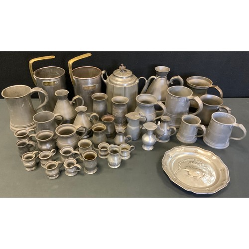 175 - A pair of Air ministry pewter dipping measures;  ale measures, jugs, plates,  jugs etc