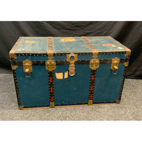 218 - A Vintage Steamer cabin trunk, Cunard liners stickers attached. 57cm tall x 102cm wide x 53cm deep.