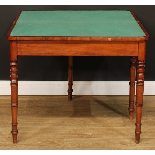 219 - A 19th century mahogany card table, hinged top enclosing a baize lined playing surface, ring-turned ... 