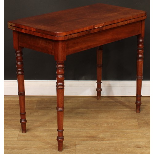 219 - A 19th century mahogany card table, hinged top enclosing a baize lined playing surface, ring-turned ... 