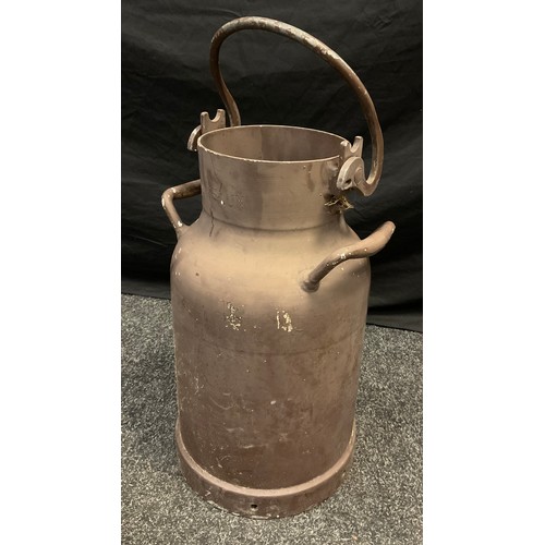 233 - A vintage milk churn, 62cm tall.