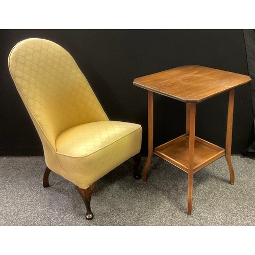 235 - An early 20th century upholstered nursing chair, sprung seat, mahogany legs;  a mahogany side table,... 