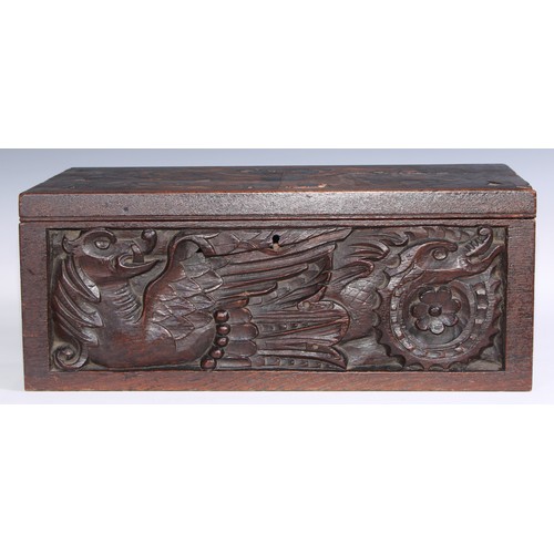 1624A - A large 19th century oak writing box, incorporating earlier panels, hinged cover inlaid in holly and... 