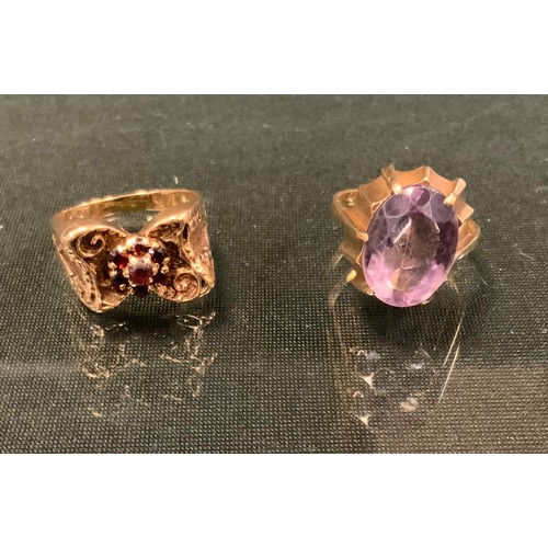 395 - A 9ct gold garnet cluster ring, size N another oval pale pinky purple amethyst, 9ct gold shank, size... 