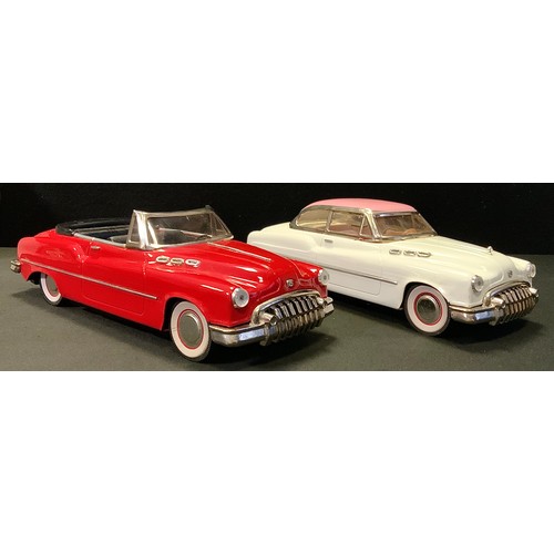 267A - A Japanese tin plate friction powered model Buick Sedan motor car, white body, pink roof, white wall... 