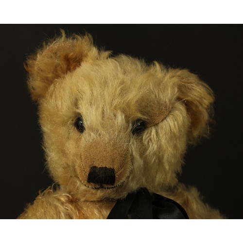 4076 - A 1930's/1940's golden mohair jointed teddy bear, probably by Merrythought, amber and black glass ey... 