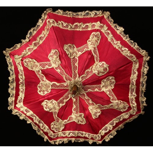 4097 - A late 19th/early 20th century doll's parasol, the wooden shaft mounted with a green enamel handle, ... 