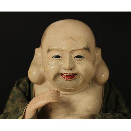 4079 - An early 20th century Chinese painted composition doll, of a Buddha, inset eyes, painted features, i... 