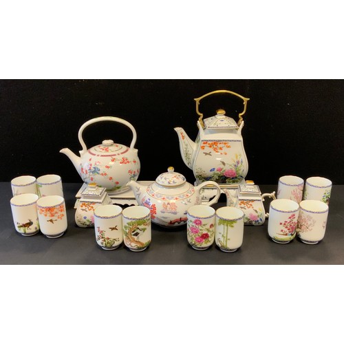 25 - A Compton and Woodhouse Japanese kettle teapot, 1989;  another Chinese Yi Hsing teapot;  a modern Ja... 