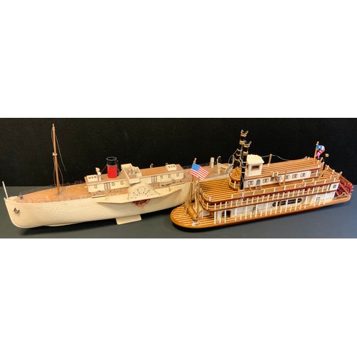 32 - A static model of a paddle steamer, single funnel, cream hull, 77cm long;  another King of Mississip... 