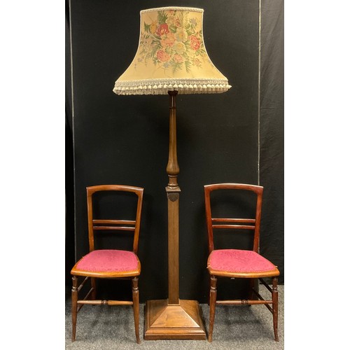 46 - A mid 20th century walnut standard lamp, turned column, square base, 188cm tall (with shade);  a pai... 