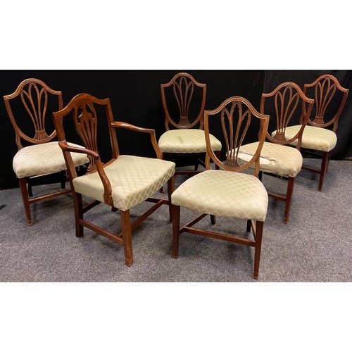 57 - A George III mahogany carver chair, wheat-sheaf splat, square legs and stretcher, and a similar set ... 