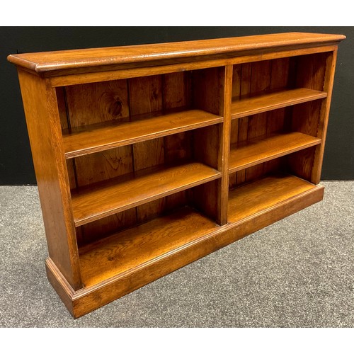 84 - A Titchmarch and Goodwin style oak double book case, 91.5cm tall x 152.5cm wide x 30.5cm deep.