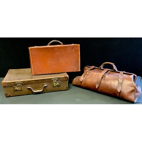 110 - Luggage - a large brown leather Gladstone type holdall, suit case etc (3)