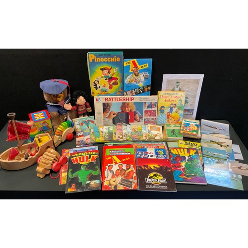 223 - Toys - pre-school wooden toys, including stacking, pull-a-long;  Battleship;  Beano annuals;  etc