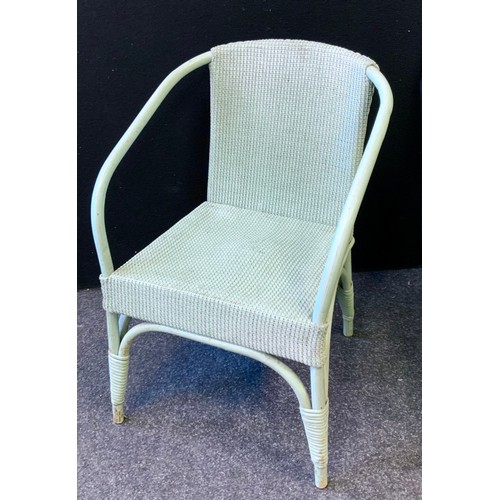 250 - A child's Lloyd Loom musical chair, in green