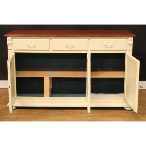 276 - A painted low dresser, rectangular top above three frieze drawers and three panel doors, skirted bas... 