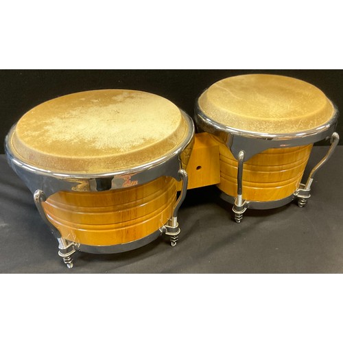 277 - A pair of Bongo drums, 50cm wide