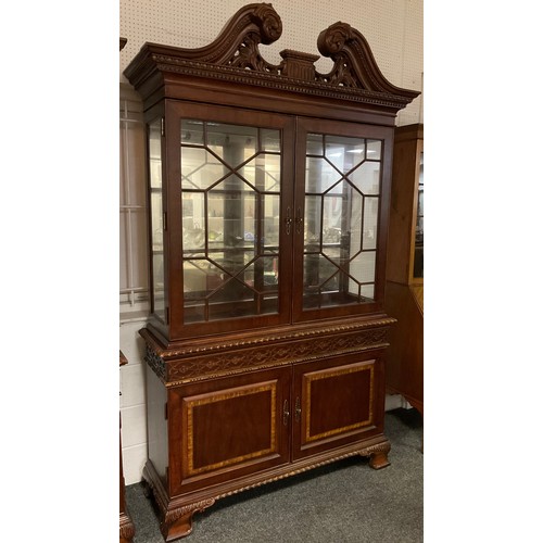 289 - A Georgian style, reproduction, bookcase cabinet, carved scroll cresting and cornice, pair of astral... 