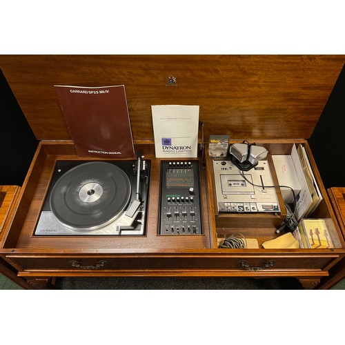 313 - A Garrard SP25 Mk IV turn-table / record deck, Dynatron tuner, and cassette recorder, housed in a bu... 